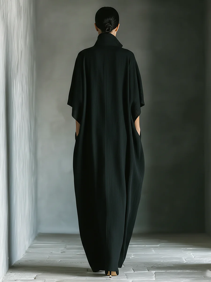 Alessandra | Vestito lungo nero oversize minimalista con maniche a kimono